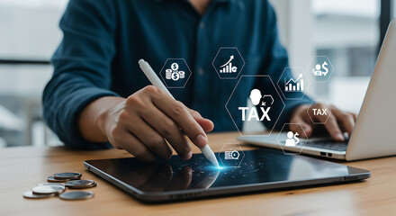 Businessman using digital tablet for tax planning and financial management