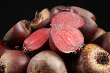 Fresh raw red beets beetroot, whole and halved