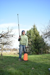Young man engaged in household chores and small-scale rural farming, tending to his garden with care and dedication. His daily routine reflects a sustainable and self-sufficient way of life