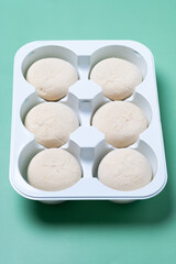 Japanese Cheesecake ice cream mochi on green background