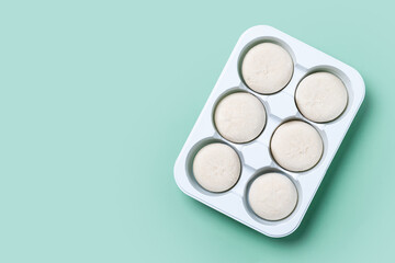 Japanese Cheesecake ice cream mochi on green background. Copy space