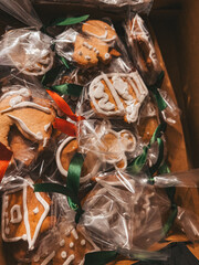 Christmas gingerbread cookies wrapped in plastic with ribbons