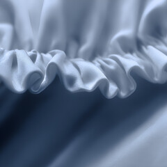 Close-up of light blue satin sleep bonnet edge with soft ruffle texture, macro view, great for product packaging, beauty brand visuals