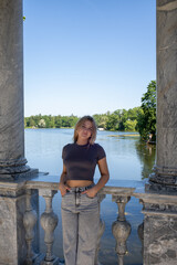 young woman sitting on the pier