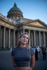 young woman in front of the building