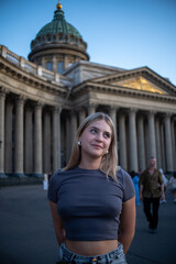 young woman in front of the building