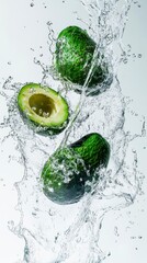 Fresh Avocados Splashing into Water with Dynamic Motion Effect