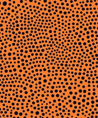 Naklejka premium A seamless pattern of brown dots on an orange background