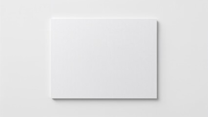 A4 size white textured paper placed on a white surface, perfect for use in logo mockups, embossing, and texture applications.