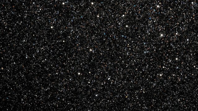 Glittering black crystal textured wall, uniform abstract backdrop