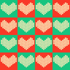 vibrant repeating pattern of knitted hearts in red and green squares