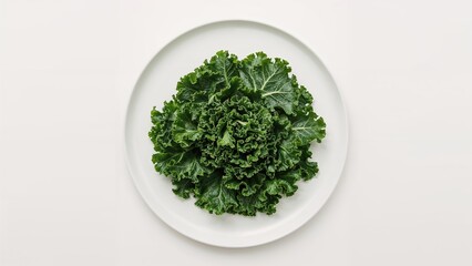 Bright green kale foliage displayed from above on a white platter