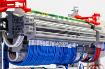 Electrical terminals with connected insulated copper wires with metal lugs. Marking with a thermal...