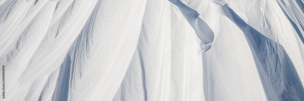 Sticker snow texture. wind sculpted patterns on snow surface. wind in the tundra and in the mountains on the