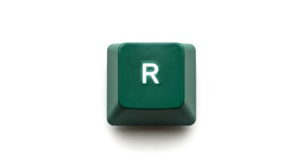 Close-up of a green keyboard key with the letter R on a white background