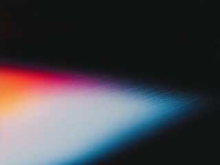 Abstract light leak effect with spectrum gradient colors. Creative film light flare on dark background. Digital art overlay for design.