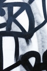 Abstract graffiti street art in black, white minimalist style. 90s retro elements, bold shapes. Urban decor, digital backgrounds, artistic textures.