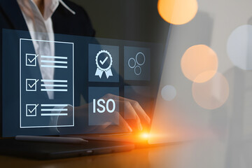 ISO Certification and Compliance Concept with Businesswoman Working on Laptop Representing Quality Standards and Regulatory Alignment