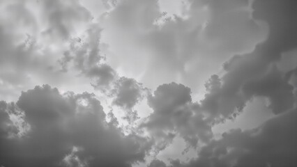 Cloud-covered sky shown in monochrome tones