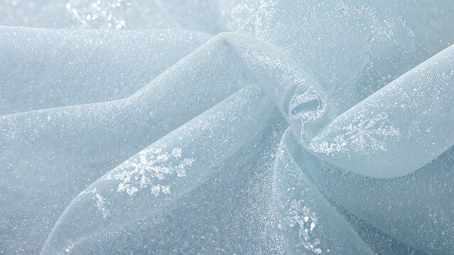 Detailed view of delicate sheer fabric with festive motifs