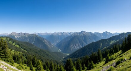 Obraz premium Breathtaking Landscape View of Majestic Mountains and Lush Green Valley in Nature's Embrace