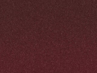 Seamless dark red speckled texture background, perfect for adding a subtle, rich feel to your designs.