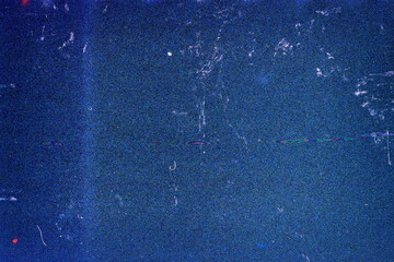 Blank grained film strip texture background with heavy grain, dust and light leak
