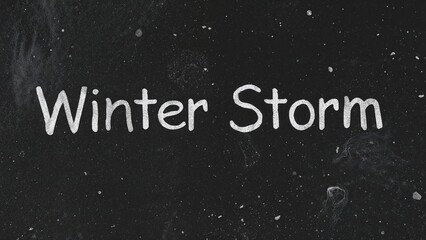 Isolated blackboard with the words winter storm written in white chalk on a white surface