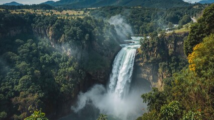 Famous Waterfall Flowing Amidst Lush Greenery in a Scenic Area