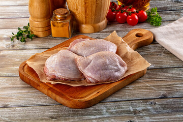 Raw chicken thighs for cooking