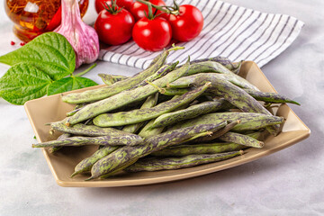 Raw green bean strips heap