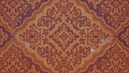 Retro geometric ornamental tile in bold orange and purple hues, suitable for abstract art, scrapbooking, and interior decoration.