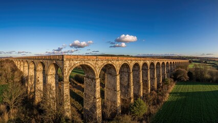 Obraz premium A wide aerial view of the eastern section of the longest brick railway bridge in the country