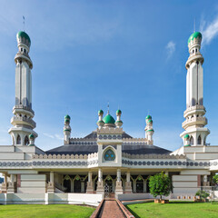 Masjid Duli Pengiran Muda Haji Al-Muhtadee Billah Mosque, a striking Islamic landmark with green...