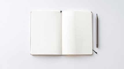 Minimalist table with an empty notebook and pen, softly lit from above on a clean white background.