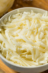 Homemade Shredded Mozzarella Cheese in a Bowl