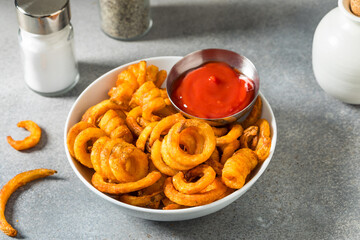 Unhealthy Seasoned Curly French Fries