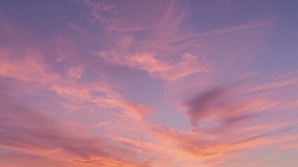 Obraz premium Gorgeous sunset with cotton candy hues, featuring soft purple, pink, orange, and blue clouds.
