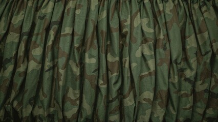 Wrinkled fabric featuring pleats and floral motifs for fashion projects