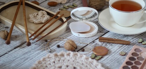 Needlework knitting objects on the table needles and clew ball wool yarn differen woman things...