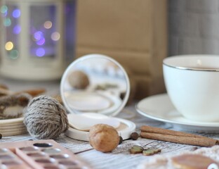  Woman's different things cup of tea, make up, ball clew yarn, mirror doily cozy photo beige pastel...