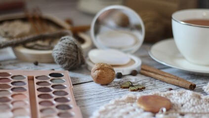 Needlework knitting objects on the table needles and clew ball wool yarn differen woman things...