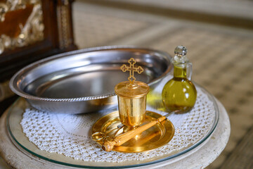 Novi Sad, Serbia - July 20, 2025: Accessories of a priest for Christian baptism. 