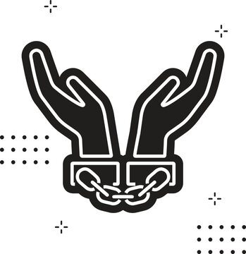 A pair of hands chained to a chain and a text words freedom. silhouette