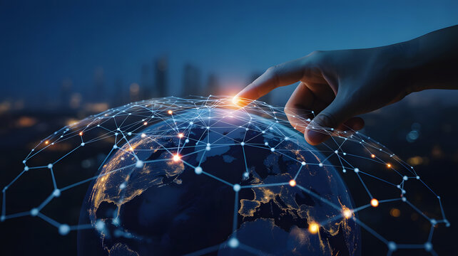 Close up of a human finger touching a glowing digital network globe representing global connectivity and technology