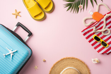 Flat lay of travel essentials for a summer vacation, including hat, bag, shoes, and other accessories against a pastel pink background