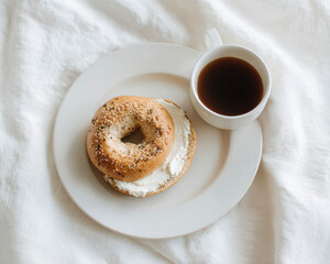 Classic Breakfast Bagel on White Plate