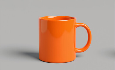 An orange mug isolated on a gray background. Copy space, space for text, wallpaper.