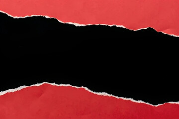 red torn paper on black background 