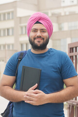 Vertical Photo of Sikh Indian Student Smiling at Camera